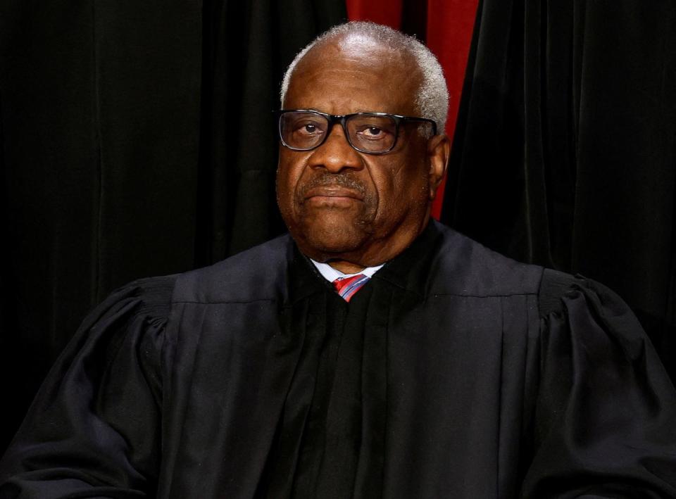 PHOTO: Supreme Court Associate Justice Clarence Thomas poses during a group portrait at the Supreme Court in Washington, October 7, 2022. (Evelyn Hockstein/Reuters)