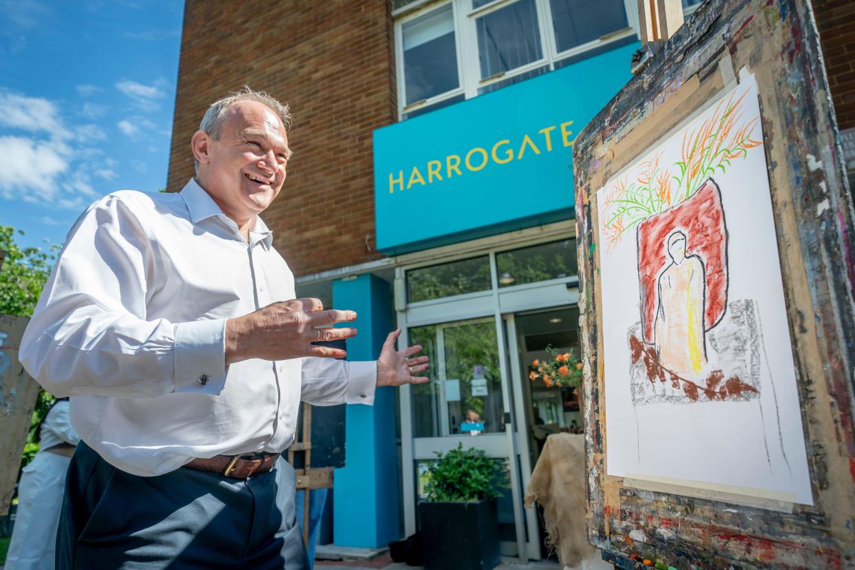 Liberal Democrats leader Sir Ed Davey next to his charcoal on pastel artwork at Harrogate College, in Harrogate, Yorkshire, while on the General Election campaign trail. Picture date: Friday June 21, 2024.