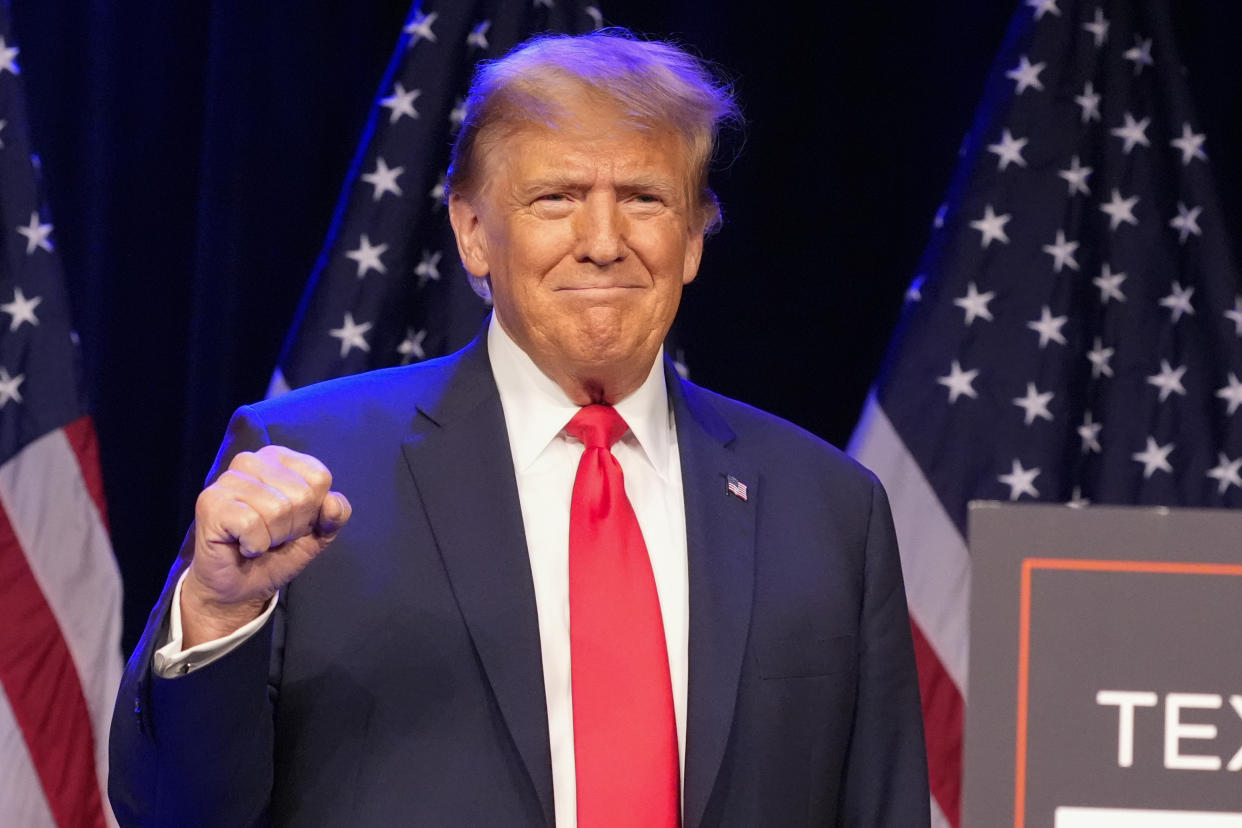 Trump arrives to speak at a caucus night rally in Las Vegas.