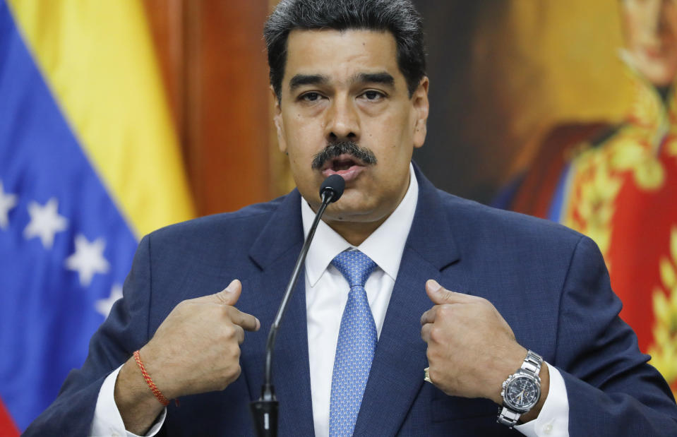 Venezuelan President Nicolas Maduro gives a press conference at Miraflores presidential palace in Caracas, Venezuela, Friday, Feb. 14, 2020. Maduro said Friday that authorities haven’t detained opposition leader Juan Guaido because the courts haven’t ordered it, but he warned: “It will come.” (AP Photo/Ariana Cubillos)