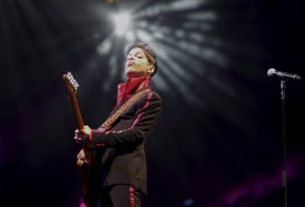 U.S. musician Prince performs on stage at Yas Arena in Yas Island, Abu Dhabi, United Arab Emirates November 14, 2010.   REUTERS/Jumana El-Heloueh/File Photo