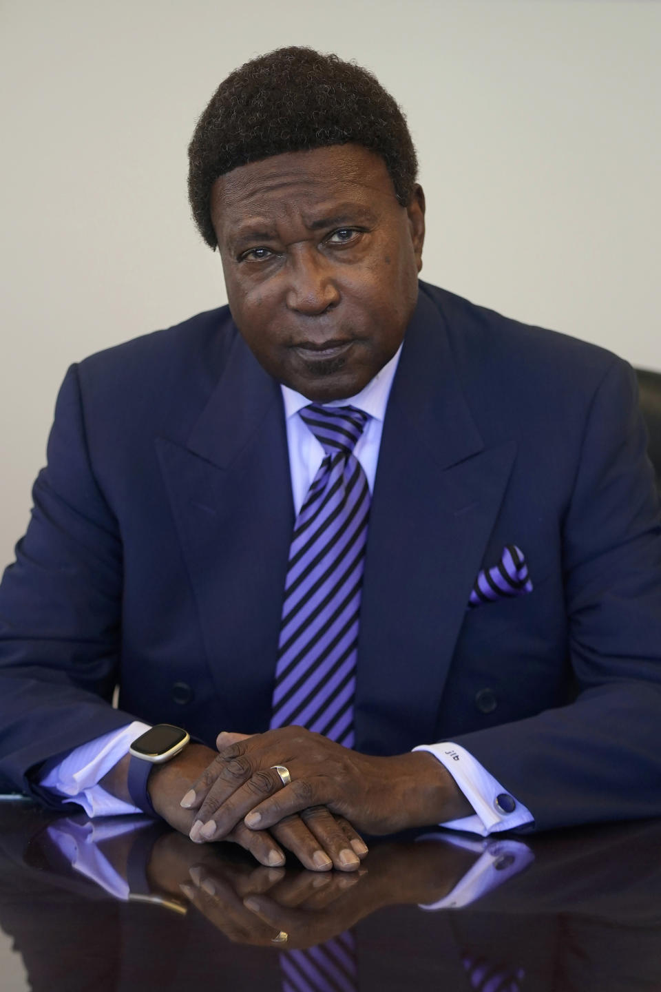 Attorney John Burris poses for photos at his office in Oakland, Calif., Tuesday, Aug. 16, 2022. For nearly 50 years, Burris has poked holes into narratives that did not add up, namely those of law enforcement accused of using excessive force. (AP Photo/Jeff Chiu)