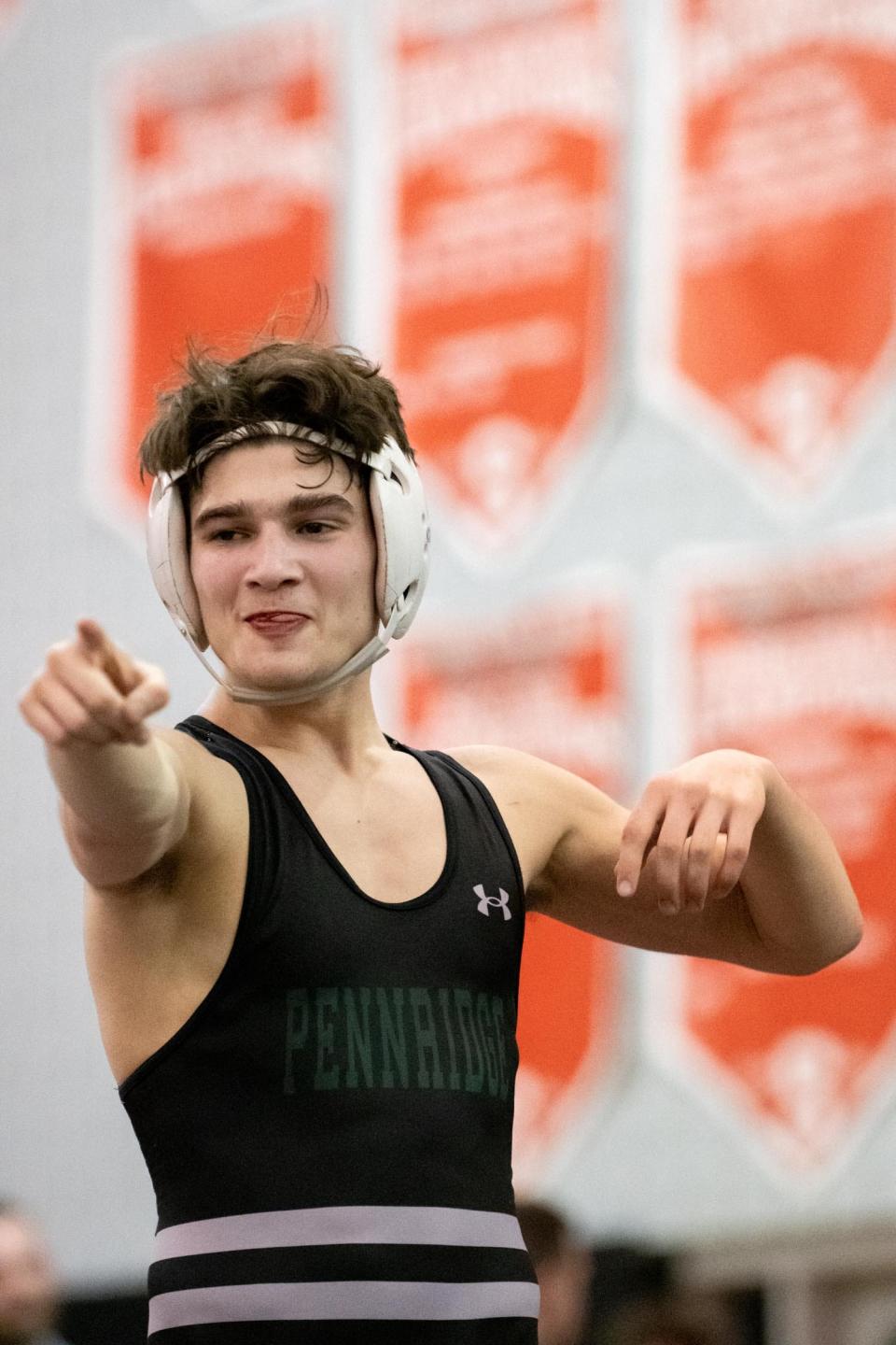 Pennridge's Sam Kuhns celebrates after defeating Oxford's Austin McMillan in the 139-pound championship match at the PIAA District One Southeast Regional Class 3A Tournament hosted at Souderton Area High School in Franconia on Saturday, March 4, 2023.