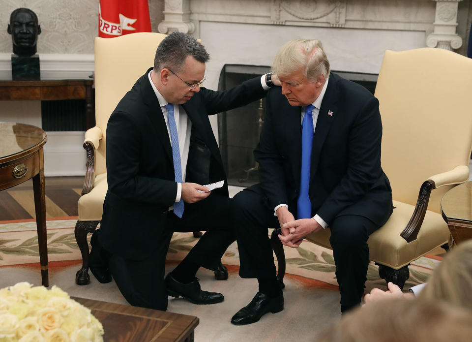 President Donald Trump prays with American pastor Andrew Brunson in the Oval Office of the White House on Oct. 13, 2018. (Photo: Mark Wilson via Getty Images)