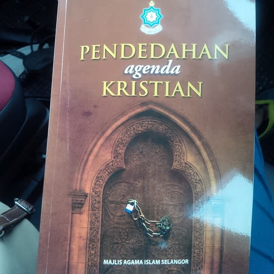 The book titled 'Pendedahan Agenda Kristian' or ‘Exposing the Christian Agenda’ warns Muslims to watch out for tricks by Christians to sway them from their faith. – The Malaysian Insider pic, June 13, 2014.