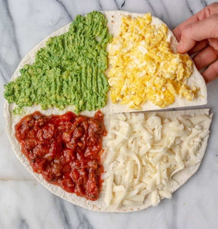 <p>Katie Workman</p><p>Choose your own toppings whether sweet or savory for this hack!</p><p><strong>Get the recipe: <a href="https://parade.com/1149882/katieworkman/tortilla-fold-hack/" rel="nofollow noopener" target="_blank" data-ylk="slk:Tortilla Fold Hack;elm:context_link;itc:0;sec:content-canvas" class="link rapid-noclick-resp">Tortilla Fold Hack</a></strong></p>