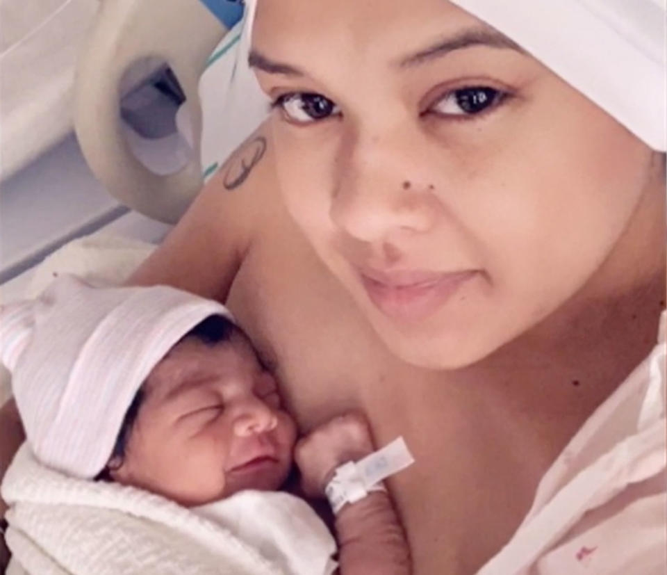 Nereida Araujo holds her baby daughter Lizyana Sky Taylor.