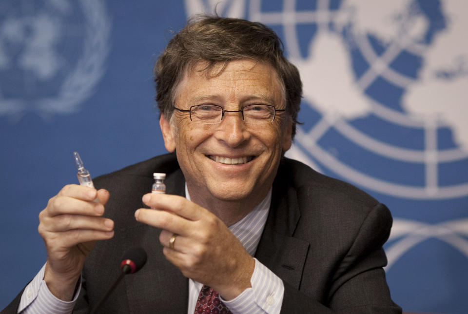 FILE - In this Tuesday, May 17, 2011 file photo, Microsoft founder Bill Gates holds a vaccine for meningitis during a news conference at the United Nations headquarters in Geneva, Switzerland. On Friday, May 8, 2020, The Associated Press reported on stories circulating online incorrectly asserting Bill Gates’ former doctor says the vaccine advocate refused to vaccinate his own children. Gates’ wife, Melinda, debunked the false claim when it circulated in April 2019. “All three of my children are fully vaccinated,” she said in a Facebook post addressing World Immunization Week. “Vaccines work. And when fewer people decide to get them, we all become more vulnerable to disease.” (AP Photo/Anja Niedringhaus)