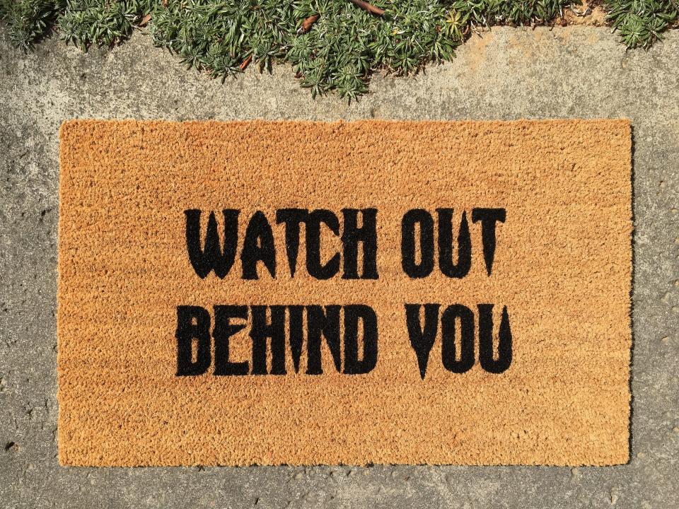 8) "Watch Out Behind You" Doormat