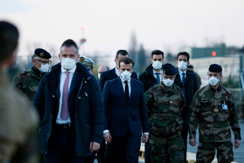 FILE PHOTO: French President Macron visits a military field hospital in Mulhouse