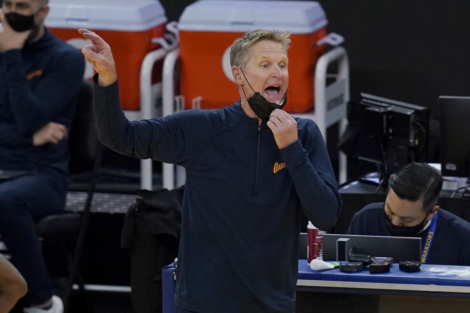 Golden State Warriors head coach Steve Kerr gestures during the first half of an NBA basketball game against the Charlotte Hornets in San Francisco, Friday, Feb. 26, 2021. (AP Photo/Jeff Chiu)