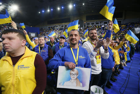 Supporters of Ukrainian opposition politician Yulia Tymoshenko attend a congress of Batkivshchyna (Fatherland) party in Kiev, Ukraine January 22, 2019. REUTERS/Valentyn Ogirenko