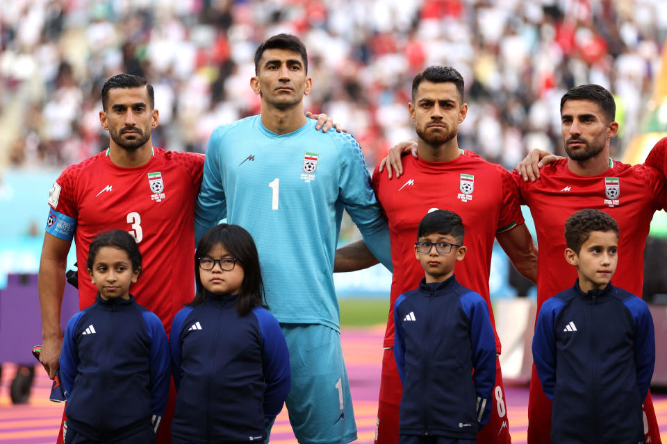 Iran players line up for the national anthem prior to the FIFA World Cup Qatar 2022 Group B match between England and Iran at Khalifa International Stadium on Nov. 21, 2022 in Doha, Qatar.