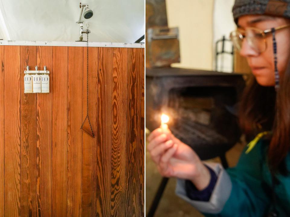 The author uses a pull-down shower (L) and makes her own fire