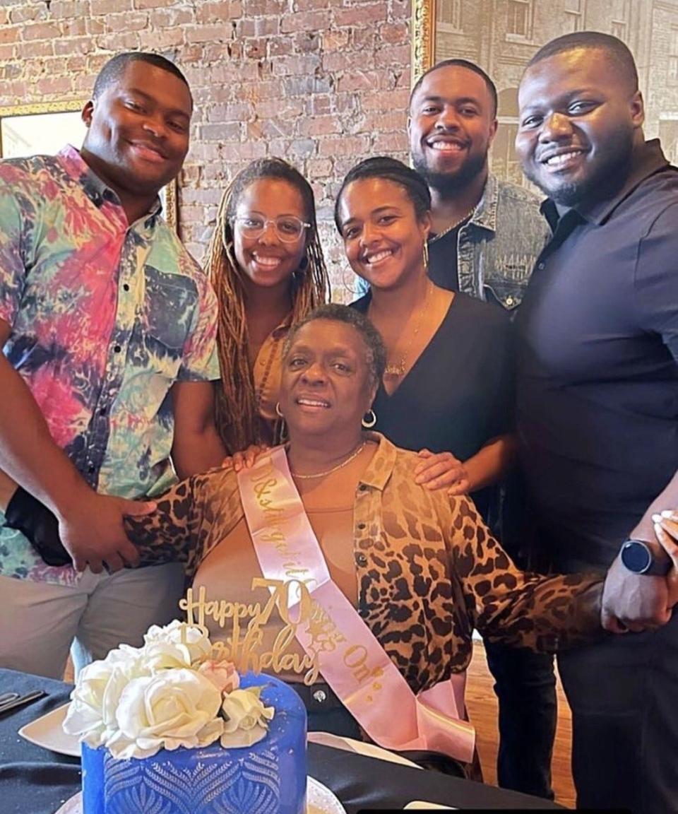 Virginia Morrison surrounded by her grandchildren: Antonio Thompson and Sydnee Bush Thompson, Krystalin Bush, Jack Bush III, and Jay Hazzard.