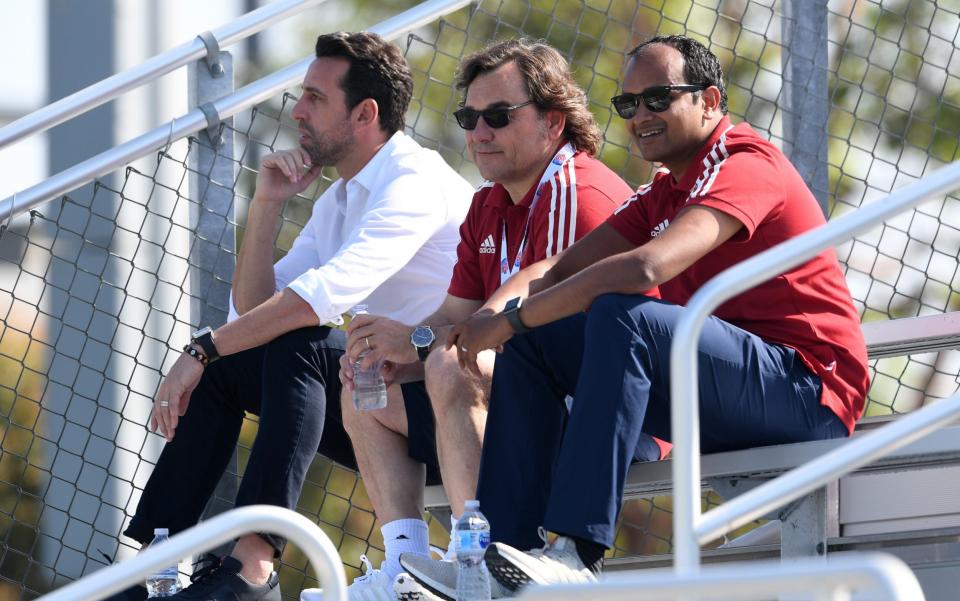 Raul Sanllehi (centre) with Vinai Venkatesham (right), Arsenal's Managing Director, and Edu, Arsenal's techincal Director - GETTY IMAGES