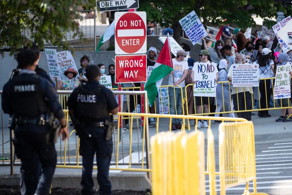 Pro-Palestinian protesters rally outside of Huntington Place before the 69th annual Fight for Freedom Fund Dinner in Detroit on Sunday, May 19, 2024.