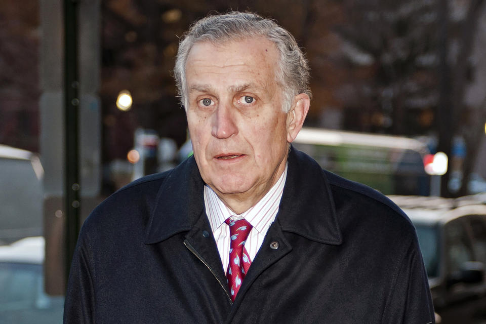 FILE - In this Nov. 30, 2012, file photo, former NFL commissioner Paul Tagliabue arrives at an attorney's office in Washington. Former NFL Commissioner Paul Tagliabue has made the Pro Football Hall of Fame in his fifth attempt. Tagliabue and former New York Giants general manager George Young made it as contributors. Ex-Dallas Cowboys safety Cliff Harris and former Cleveland receiver Mac Speedie completed the centennial class announced Wednesday, Jan. 15, 2020. The class of 10 senior candidates, three contributors and two coaches are part of the hall's celebration of the NFL's 100th season. (AP Photo/Cliff Owen, File)