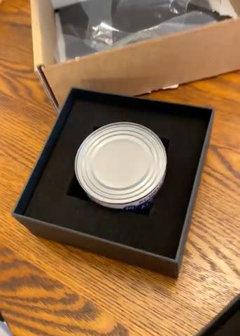 <p>Bailey Cormier/TikTok</p> A photo of the can of tuna Bailey received from Saks Fifth Avenue.