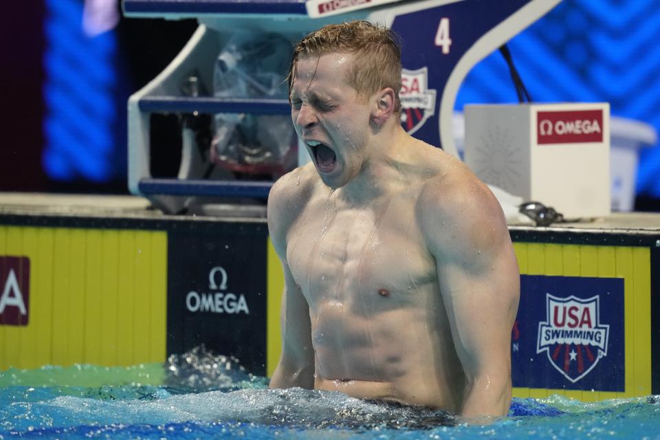 Zach Harting reacts after winning the men's 200 butterfly during wave 2 of the U.S. Olympic Swim Trials on Wednesday, June 16, 2021, in Omaha, Neb. (AP Photo/Charlie Neibergall)