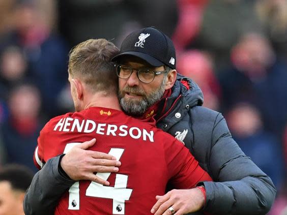 Henderson and Klopp embrace (Getty)