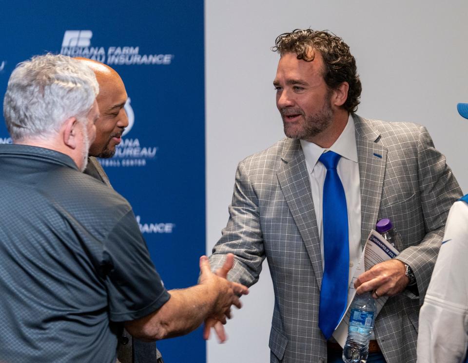 Newly announced interim head coach Jeff Saturday greets media members following a press conference on Monday, Nov. 7, 2022, during a press conference at the Colts headquarters in Indianapolis. 