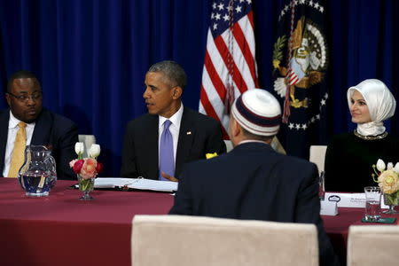 Muslim American community leaders sit for a roundtable discussion with U.S. President Barack Obama (2nd L) at the Islamic Society of Baltimore mosque in Catonsville, Maryland February 3, 2016. REUTERS/Jonathan Ernst