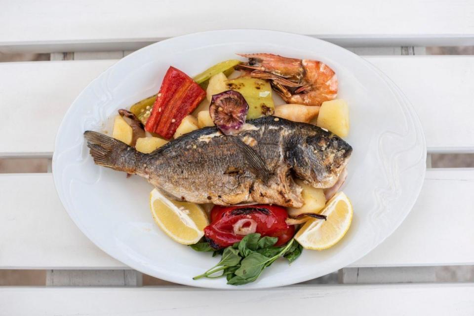 Sample the freshly caught fish at local restaurants