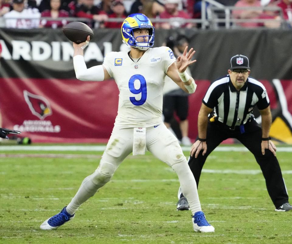 Los Angeles Rams quarterback Matthew Stafford (9) throws a pass against the Arizona Cardinals in Glendale on Nov. 26.