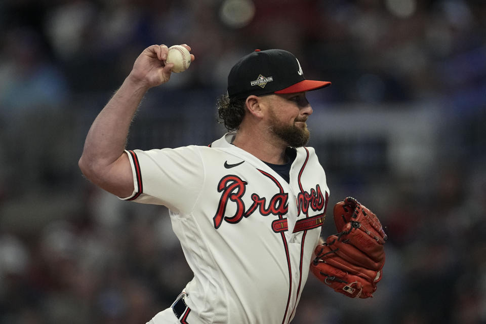 Atlanta Braves relief pitcher Kirby Yates (22) works from the mound against the Philadelphia Phillies in the fifth inning of Game 2 of a baseball NL Division Series, Monday, Oct. 9, 2023, in Atlanta. (AP Photo/John Bazemore)