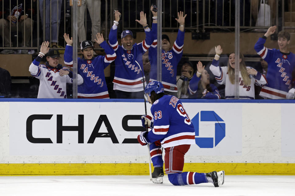 New York Rangers' Mika Zibanejad reacts after scoring a goal against the Carolina Hurricanes in the first period of Game 3 of an NHL hockey Stanley Cup second-round playoff series, Sunday, May 22, 2022, in New York. (AP Photo/Adam Hunger)