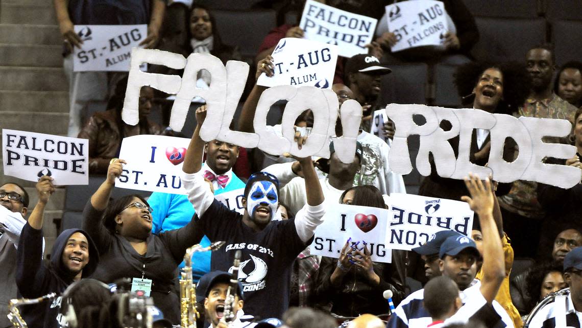 2/27/10 Saint Augustine College Falcons fans celebrate their team’s play vs the Elizabeth City State University Vikings Saturday during the men’s championship game of the 2010 CIAA Basketball Tournament at Time Warner Cable Arena in Charlotte, NC. Saint Augustine College defeated Elizabeth City State 63-59. JEFF SINER - jsiner@charlotteobserver.com JEFF SINER/JEFF SINER - jsiner@charlotteobs
