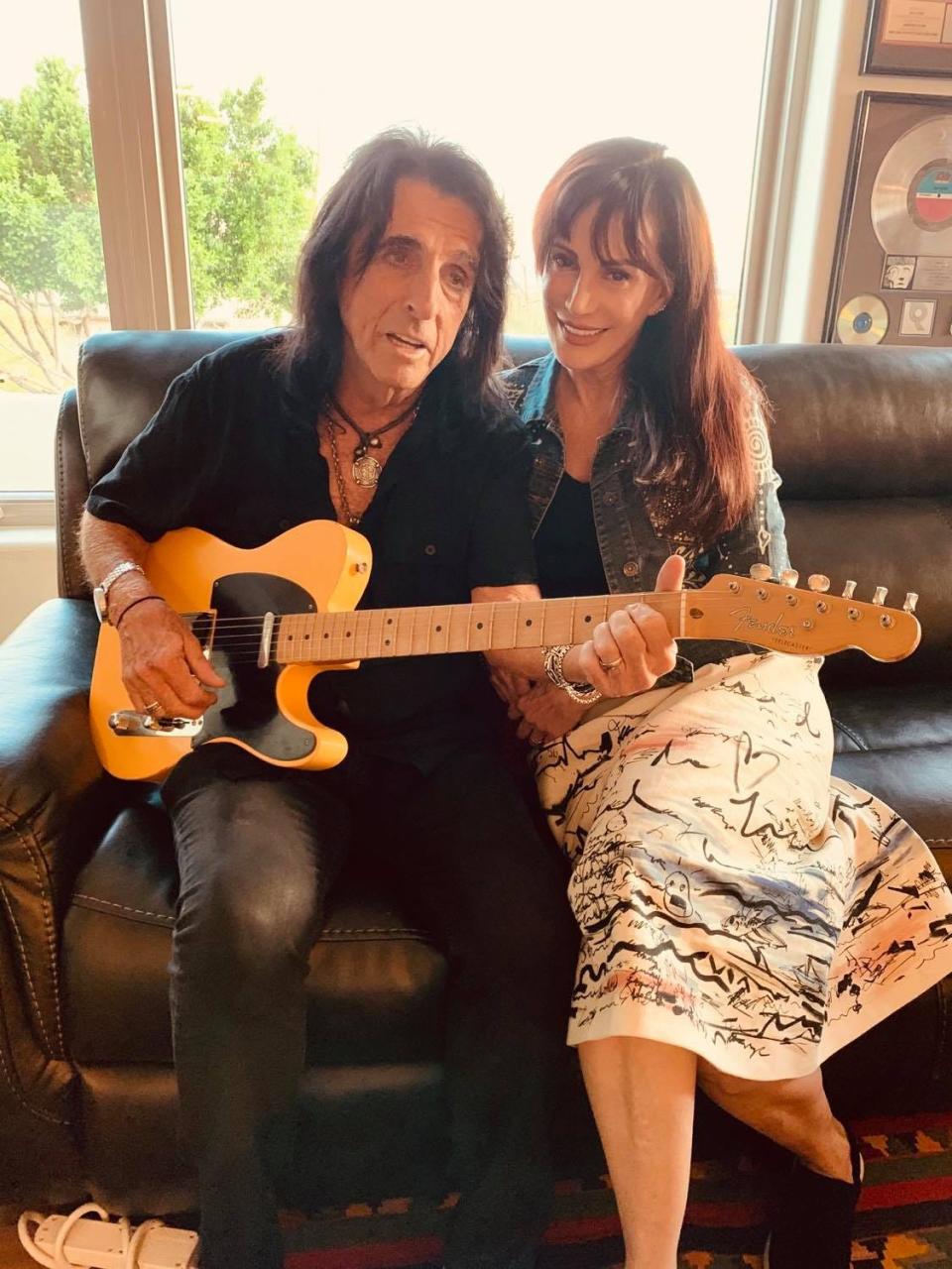Alice and Sheryl Cooper at home in Paradise Valley, Arizona, after cutting short his European tour dates.