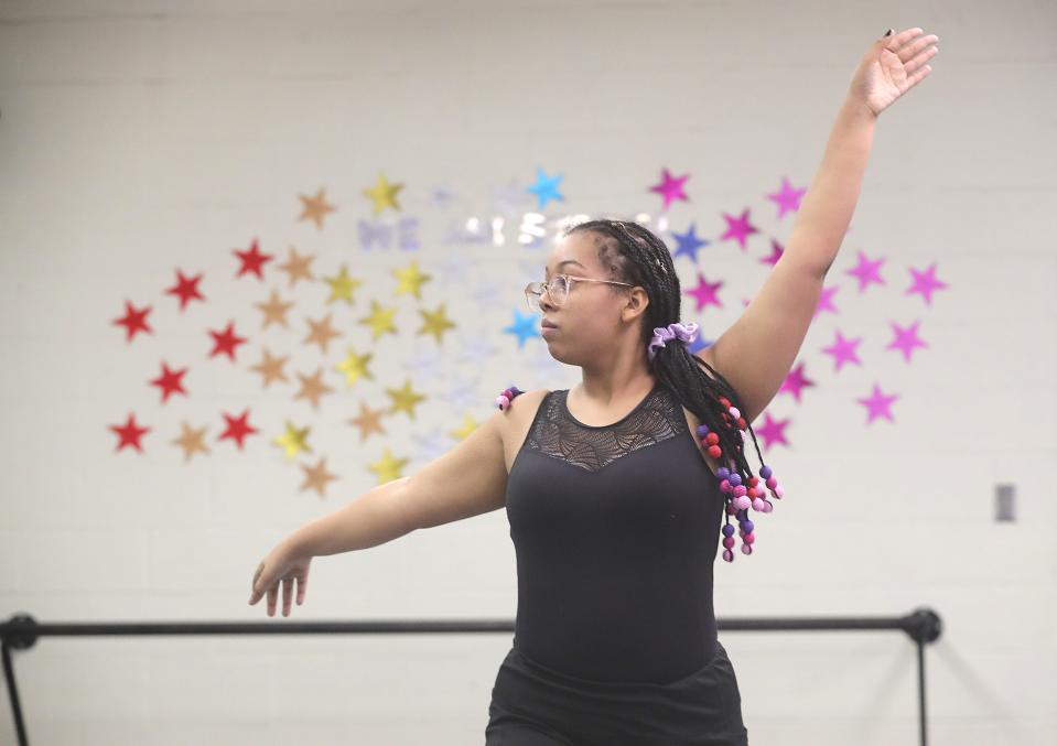 Miller South student Xenn Jacobs rehearses Tuesday for her school's 30th anniversary celebration. Ten dance alumni will join students in performing "Good Times."