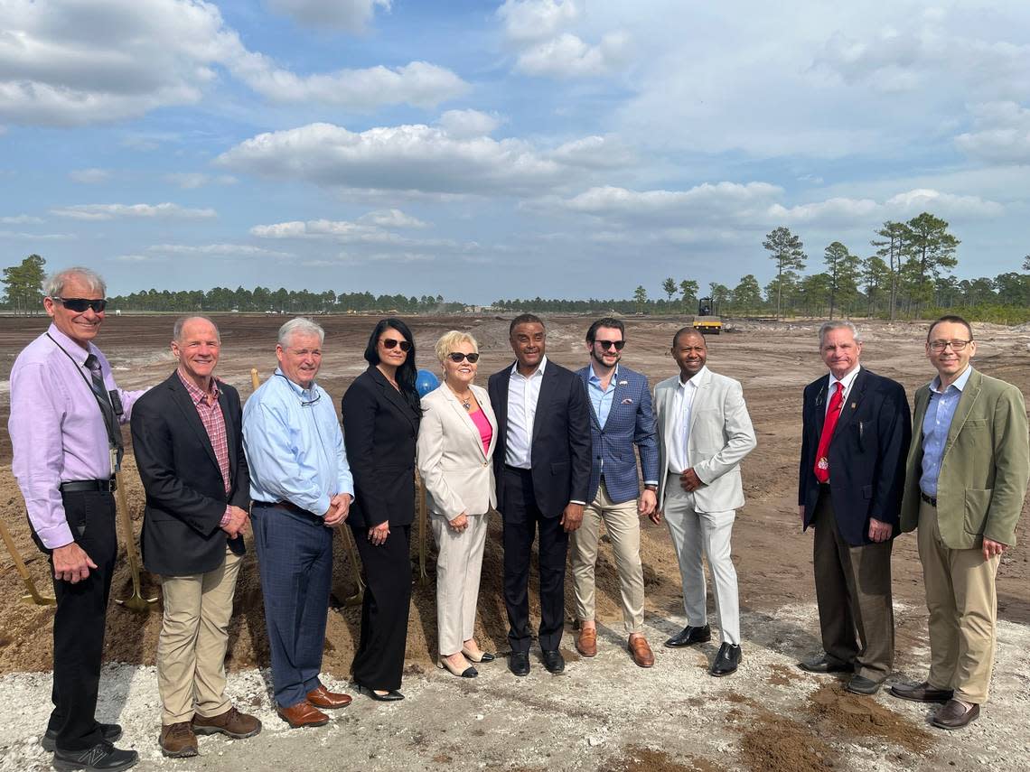 North Myrtle Beach city manager Mike Mahaney, far left, stands with members of the city council at a Feb. 24, 2023 groundbreaking inside the Palmetto State Industrial Park. A body camera was affixed to Mahaney’s shirt during the event.