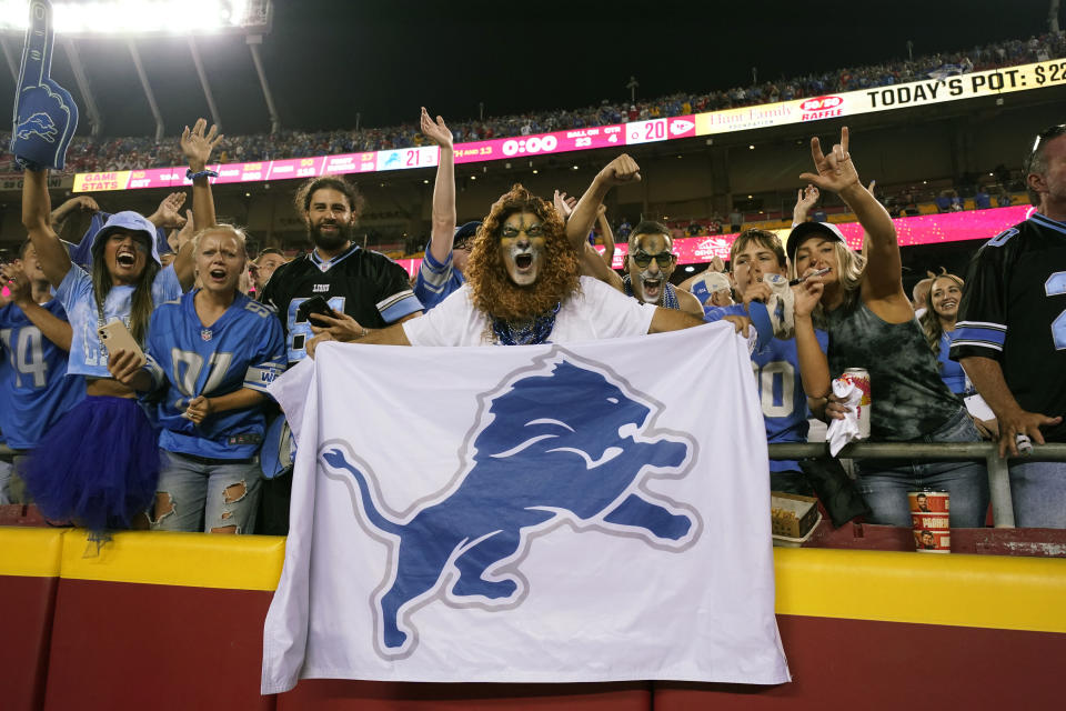 Detroit Lions fans celebrate following an NFL football game between the Detroit Lions and Kansas City Chiefs Thursday, Sept. 7, 2023, in Kansas City, Mo. The Lions won 21-20. (AP Photo/Charlie Riedel)