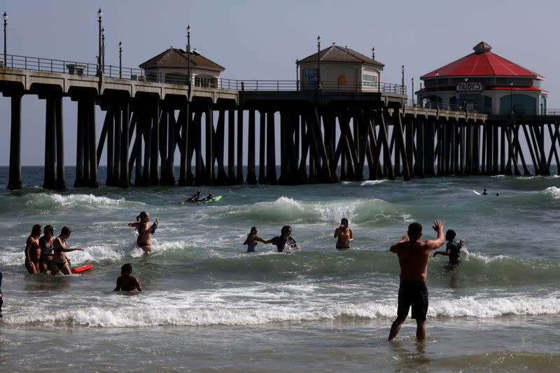 People at the beach on Memorial Day weekend during the outbreak of the coronavirus disease (COVID-19) in Huntington Beach, California