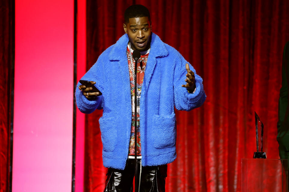 Kid Cudi wearing blue coat