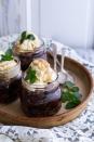 <p>These mini cakes combine butterscotch, pecan praline, and chocolate. Serve in a mini Mason jar topped with ice cream for bonus points!</p><p><strong>Get the recipe at <a href="http://www.halfbakedharvest.com/kentucky-derby-mini-chocolate-pecan-cakes-vanilla-bourbon-smash-ice-cream/" rel="nofollow noopener" target="_blank" data-ylk="slk:Half Baked Harvest;elm:context_link;itc:0;sec:content-canvas" class="link ">Half Baked Harvest</a></strong>.</p>