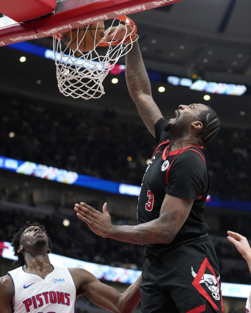 Chicago Bulls' Andre Drummond dunks against the Detroit Pistons during the first half of an NBA basketball game Tuesday, Feb. 27, 2024, in Chicago. (AP Photo/Charles Rex Arbogast)