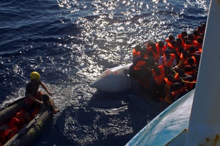 Miguel Duarte carries out a rescue operation from the Iuventa ship on the Mediterranean Sea