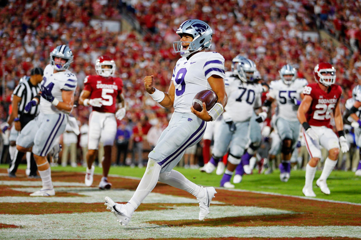 Kansas State quarterback Adrian Martinez (9) scores a touchdown against the Oklahoma Sooners at Oklahoma Memorial Stadium on September 24, 2022 in Norman, Oklahoma. (Photo by Brian Bahr/Getty Images)