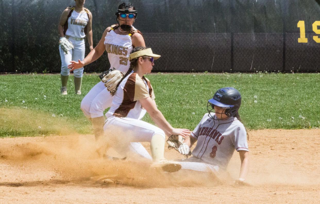 Nyack's Maeve O'Donnell successfully slides into second to steal a base during the Nyack Red and Black Tournament third-place game on Sunday, May 7, 2023.