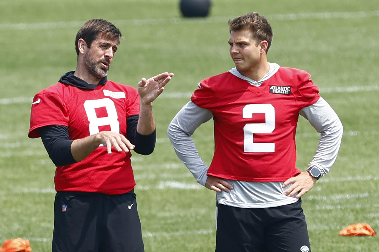 Things could get awkward between Aaron Rodgers and Zach Wilson with the Jets this season. (Photo by Rich Schultz/Getty Images)