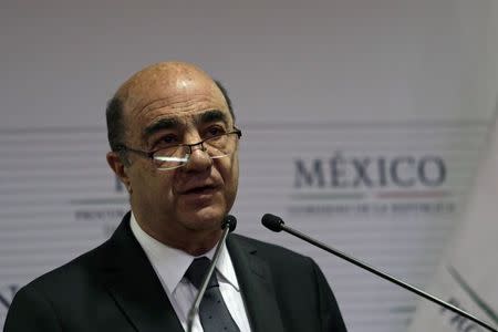 Attorney General Jesus Murillo speaks during a news conference at the attorney general's office in Mexico City December 7, 2014. REUTERS/Carlos Jasso