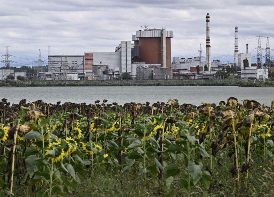 <div class="inline-image__caption"><p>A photograph taken on Sept. 20, 2022, shows the Pivdennoukrainsk nuclear power plant, amid the Russian invasion of Ukraine.</p></div> <div class="inline-image__credit">Genya Savilov/AFP via Getty</div>