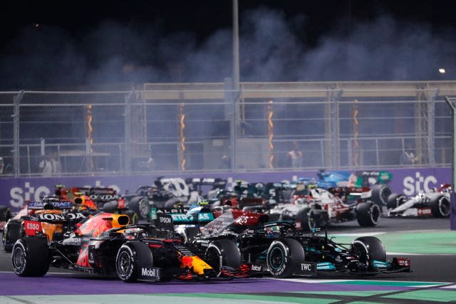 Max Verstappen, left, and  Lewis Hamilton in action