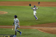 Los Angeles Dodgers catcher Austin Barnes celebrates the final out by Tampa Bay Rays' Willy Adames to win the baseball World Series in Game 6 Tuesday, Oct. 27, 2020, in Arlington, Texas. (AP Photo/David J. Phillip)