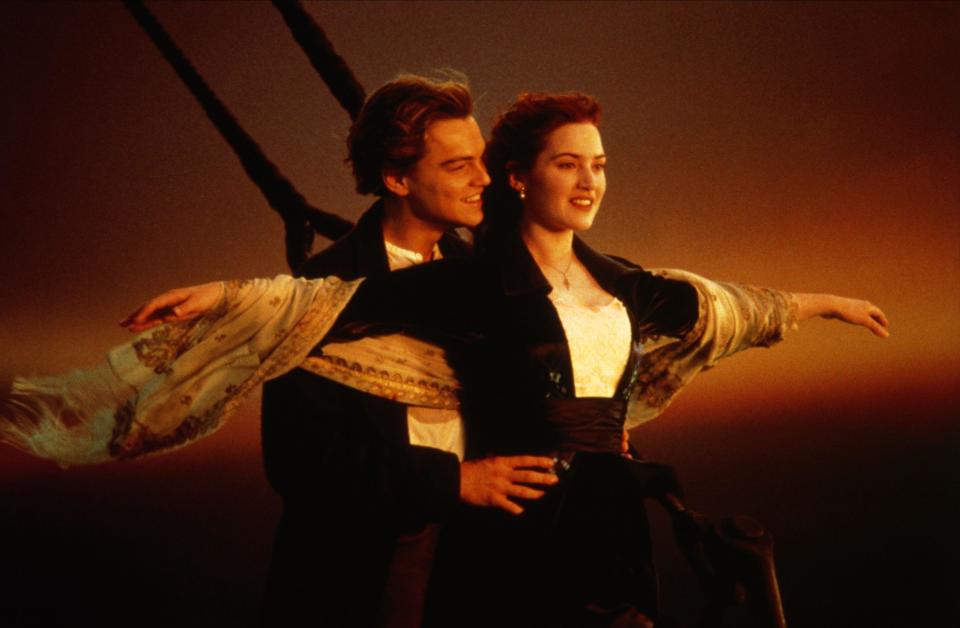 Leonardo DiCaprio and Kate Winslet stand on the front of The Titanic for the iconic "I'm Flying" scene