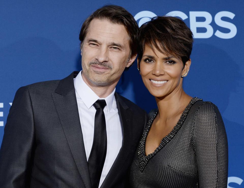Cast member Halle Berry and husband Olivier Martinez pose at premiere of TV series "Extant" in Los Angeles